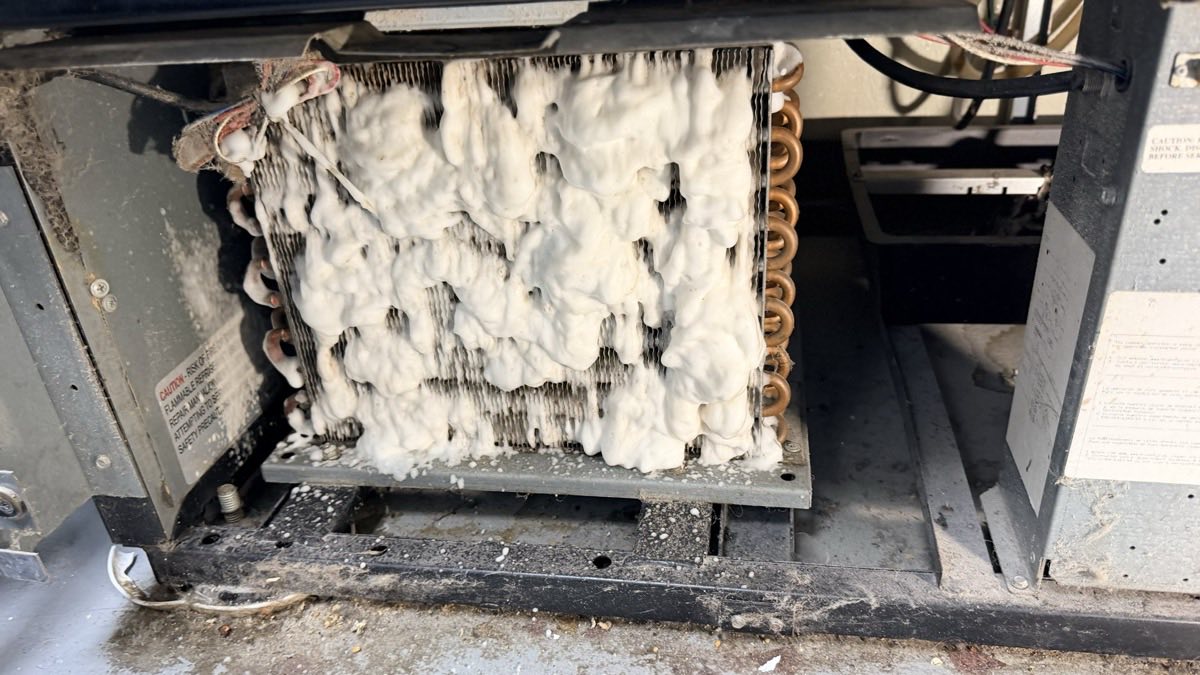 Foaming coil cleaner applied to a fouled commercial condenser coil during service