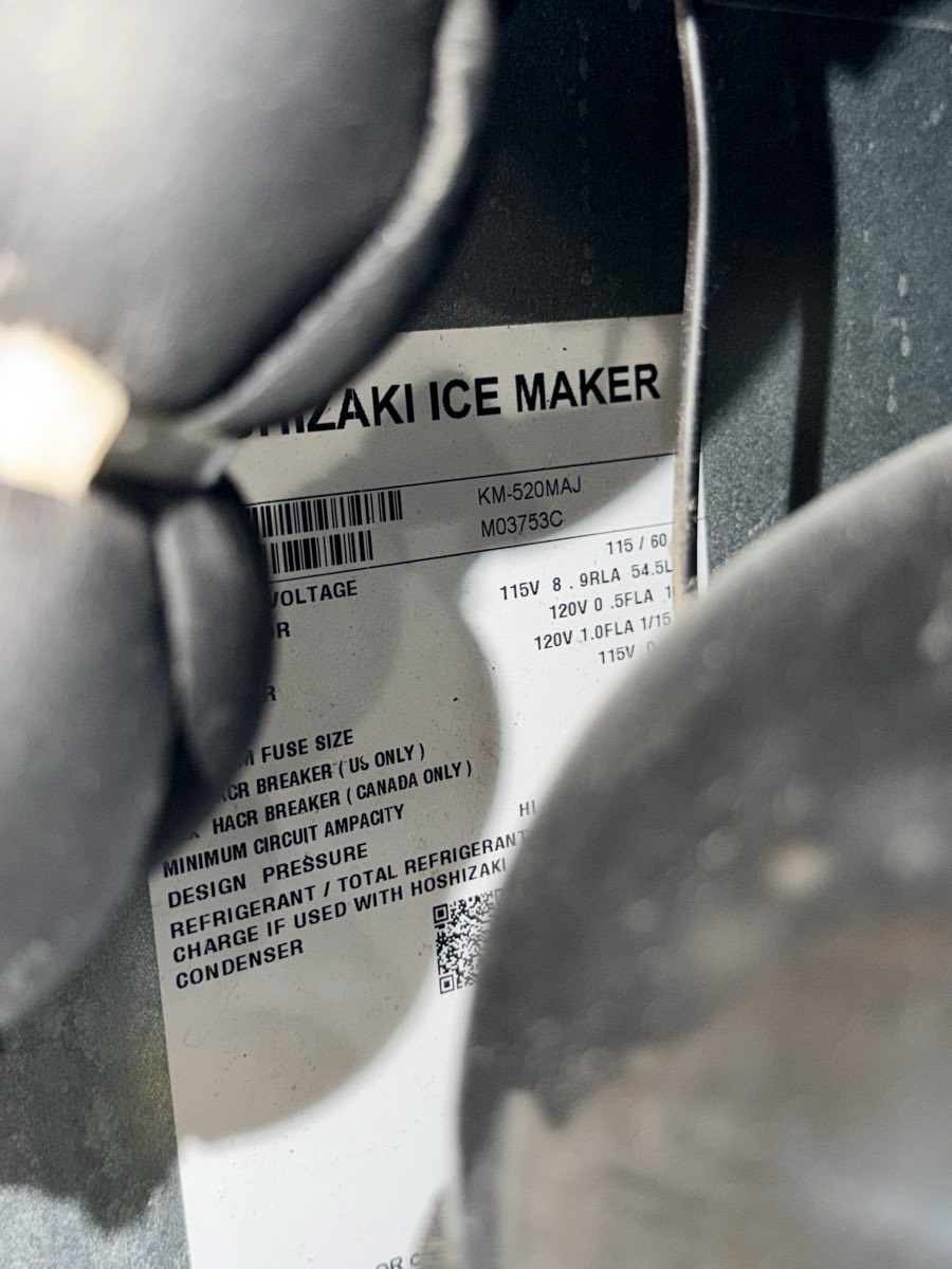 Hoshizaki ice maker nameplate showing model KM-520MAJ during a service call