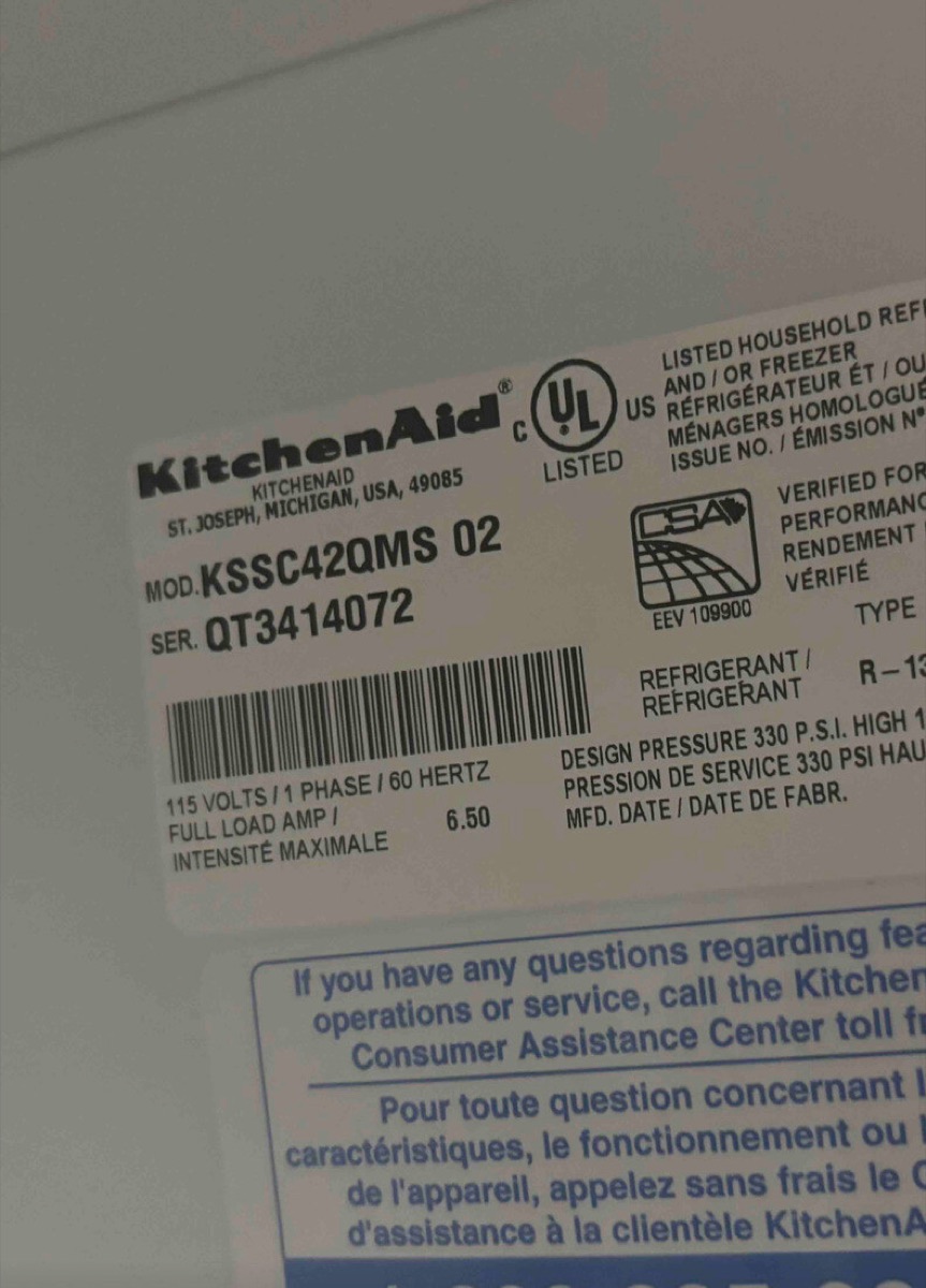 KitchenAid built-in side-by-side refrigerator nameplate showing model KSSC42QMS